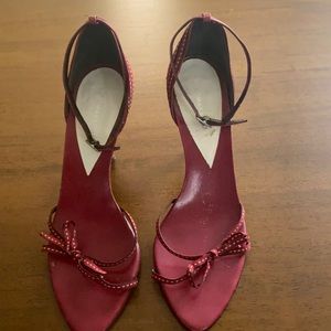 BCBG red sandal with black/white stitching.